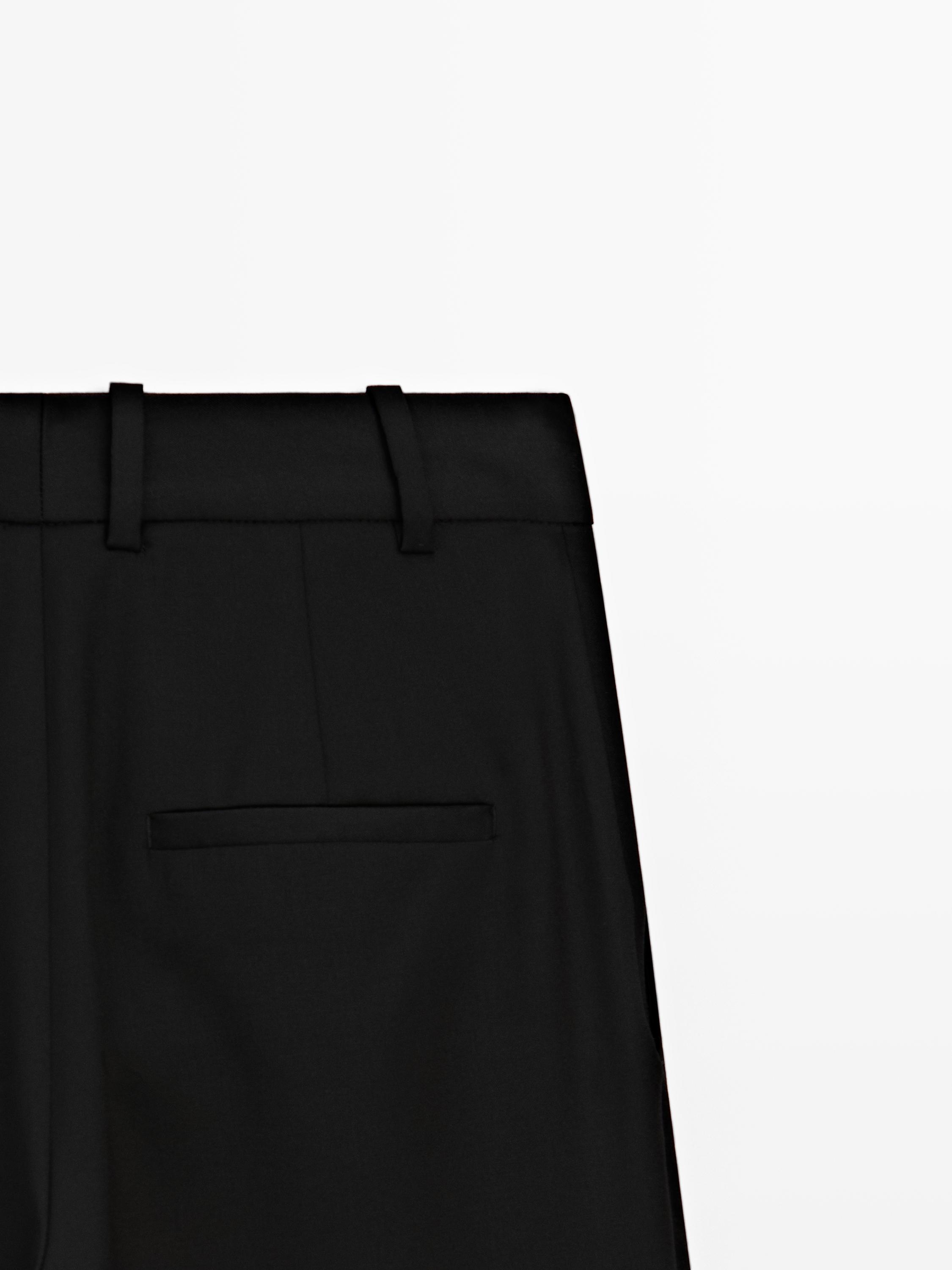 Pleated extra fine wool trousers